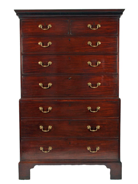 18th century George III mahogany tallboy

The chest stands on square bracket feet with oak lined drawers that have the original brass swan neck handles. The chest has a wonderful dental cornice and some of the original keys to the locks.