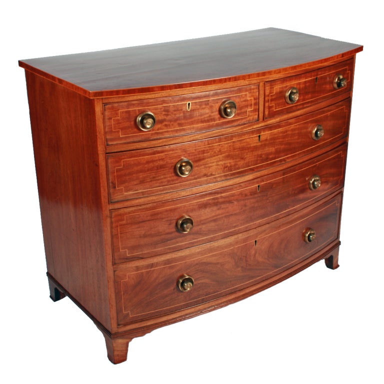 Two George III Bow Front Mahogany Chests