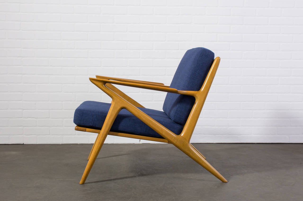 This vintage Mid-Century iconic 'Z' chair was designed by Poul Jensen in 1958, Denmark.  This lounge chair has been professionally upholstered in a blue fabric and has new cushion inserts.