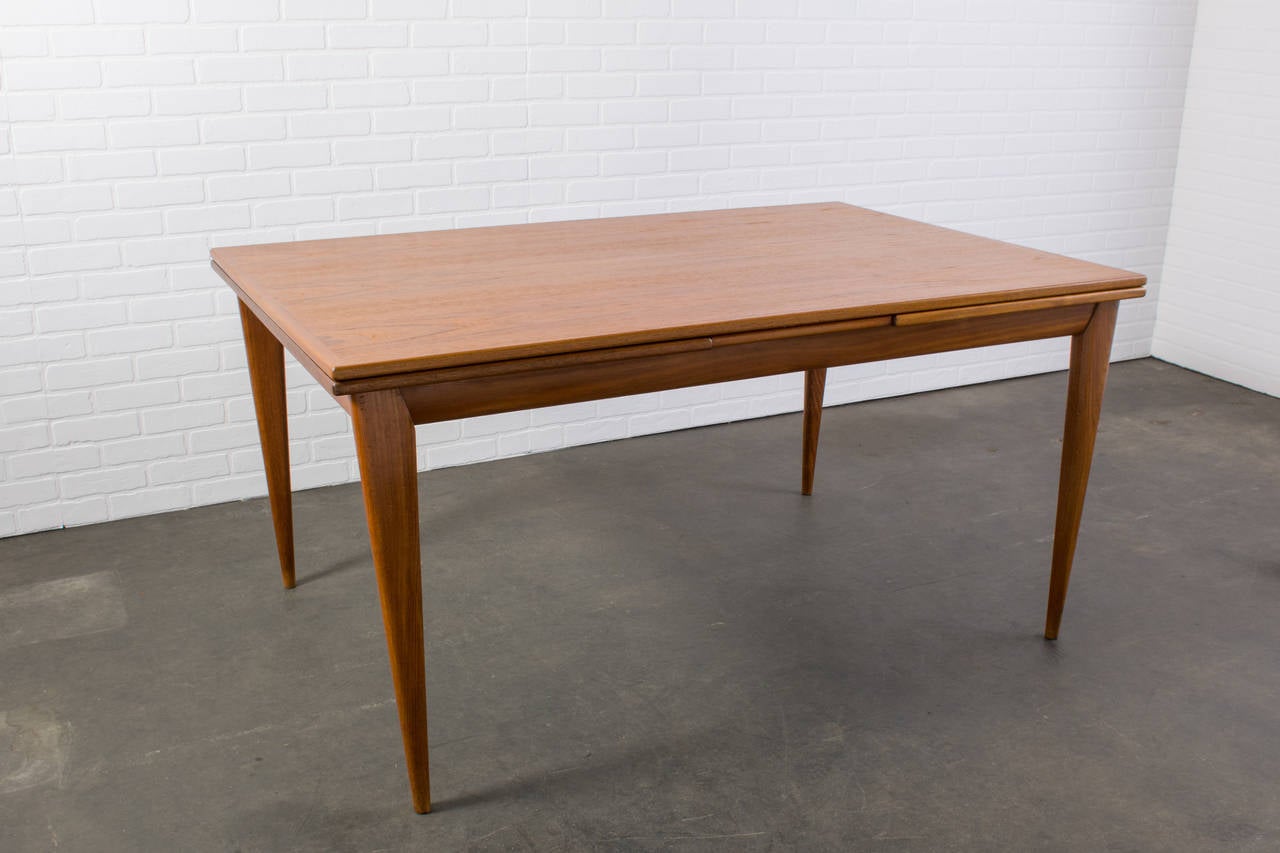 Scandinavian Modern Danish Modern Teak Dining Table with Leaves by J.L. Moller