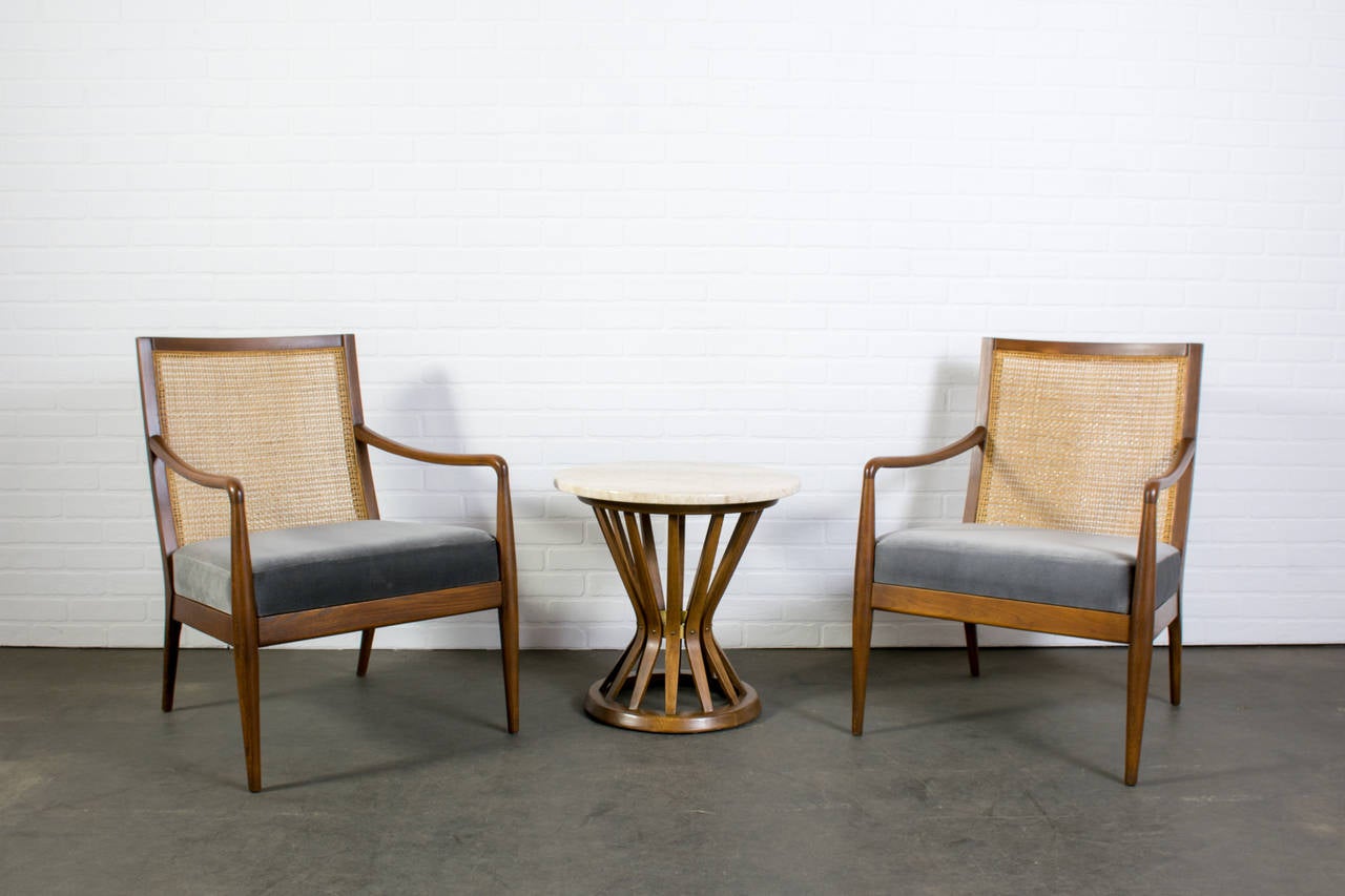 This is a pair of vintage chairs by Richardson Nemschoff. They have sculptural oak frames, cane backs and professionally reupholstered grey seats.