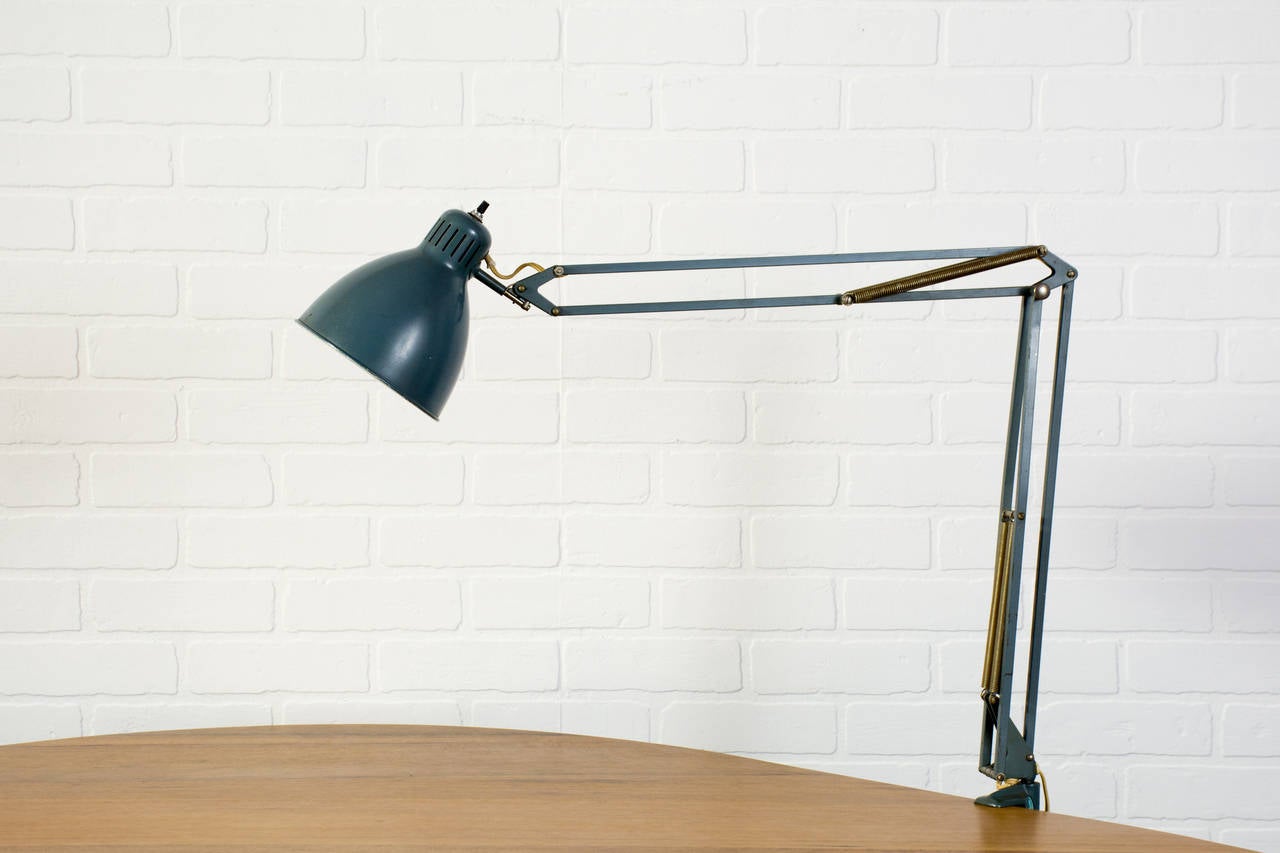 This is a vintage task lamp with a clamp by Luxo. The Luxo lamp was designed by Jacob Jacobsen and was first produced in Norway in 1937.

Measurements:
38.5