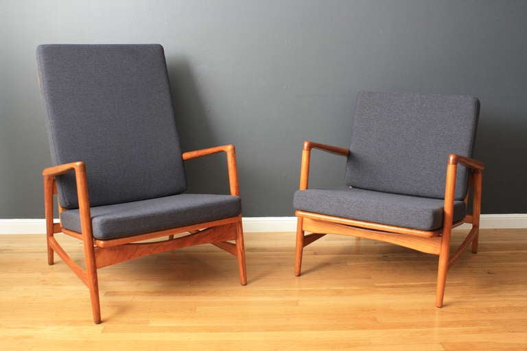 This is a set of IB Kofod-Larsen lounge chairs that both recline in 4 different positions. They have been professionally upholstered and are in great condition. The 
