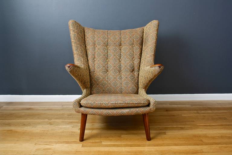 This is a vintage Mid-Century 'Papa Bear' chair by Hans Wegner. Upholstery service available.