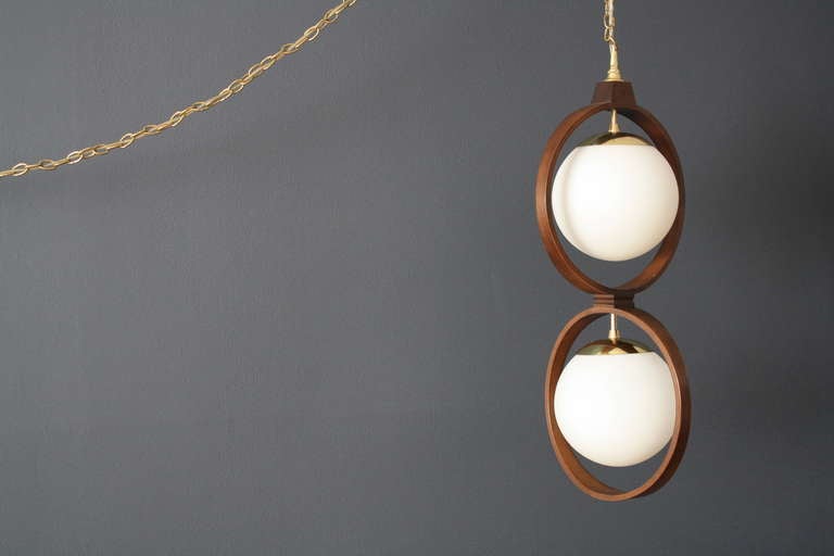 This vintage Mid-Century Modeline hanging lamp has a dimmer switch and the cord is 10'L.