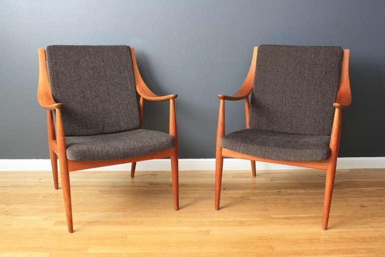This is a pair of Danish Modern lounge chairs, ModelFD-146, designed by Peter Hvidt and Orla Molgaard Nielsen for France and Daverkosen. They have new cushions and upholstery.