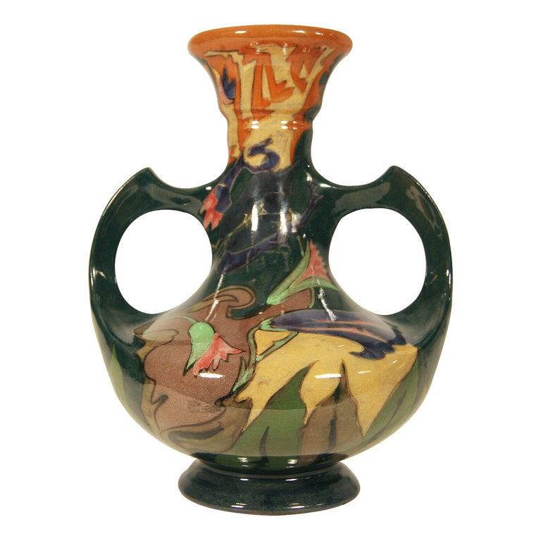 This late Victorian vase features an engaging glazed surface painted by Bernardus Römer who worked for Zuid-Holland from 1898 to 1899. 

Signed by Gouda and Römer (see picture).