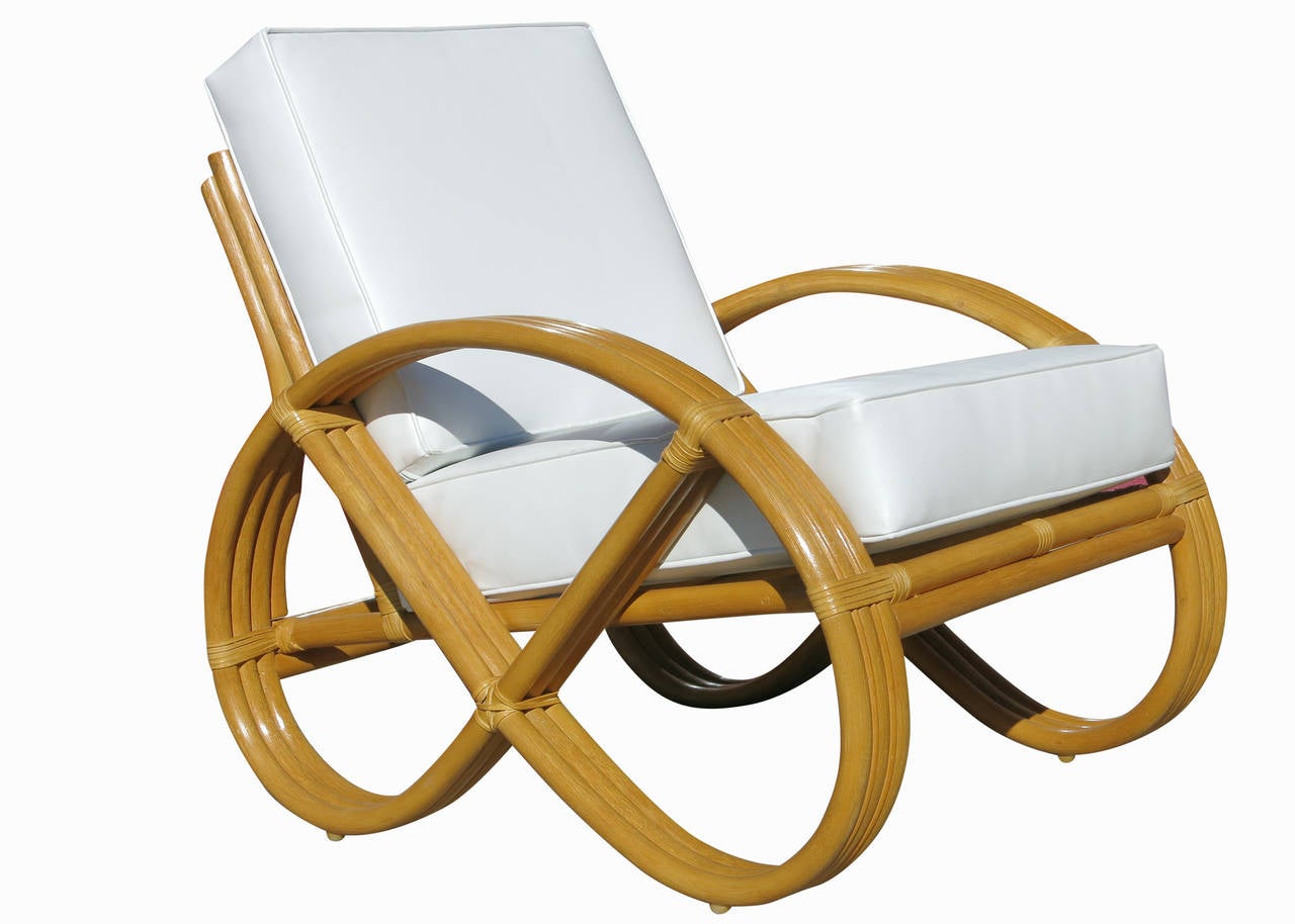 Art Deco styled round pretzel arm rattan lounge chair with custom-made cushions available C.O.M. and freshly constructed rattan frame.

1- Available

Cushions made to order included. The cushions pictured in these photos are for display use only, we