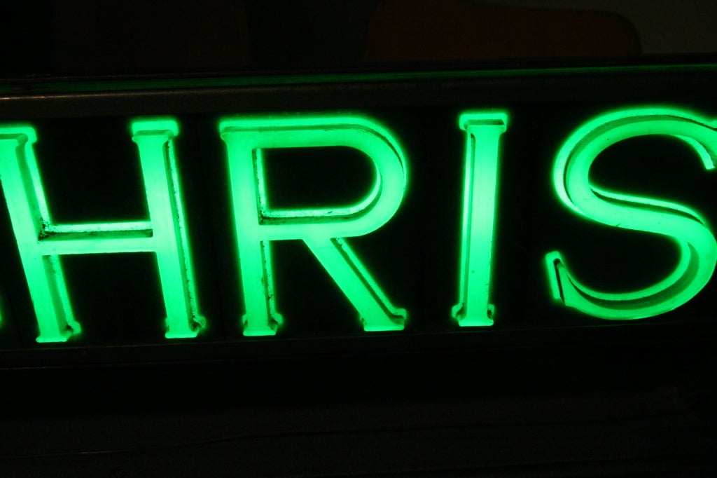 This cheerful post war enameled steel sign features light up plastic letters with 