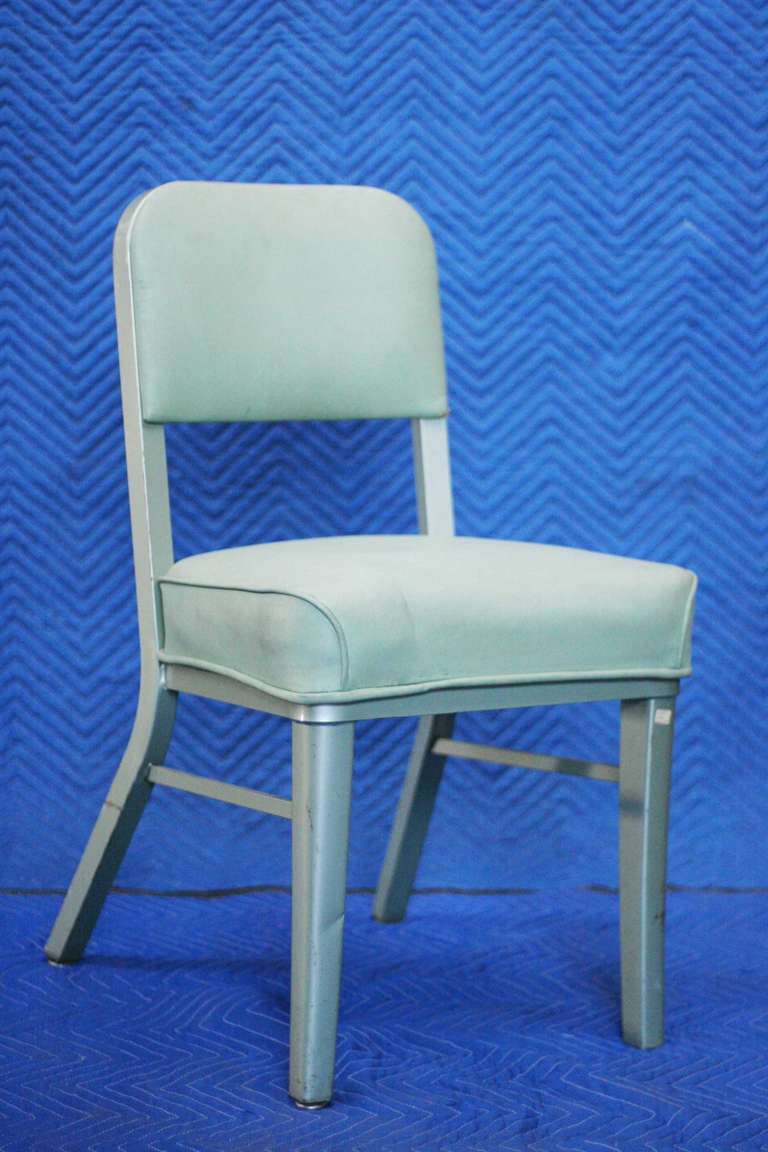 Steelcase Model 233 industrial office Chair featuring an all steel frame with a grey vinyl top.

The Steelcase company has has been producing office furniture for over 100 years. In the 1930s the company partnered with Frank Lloyd Wright to create