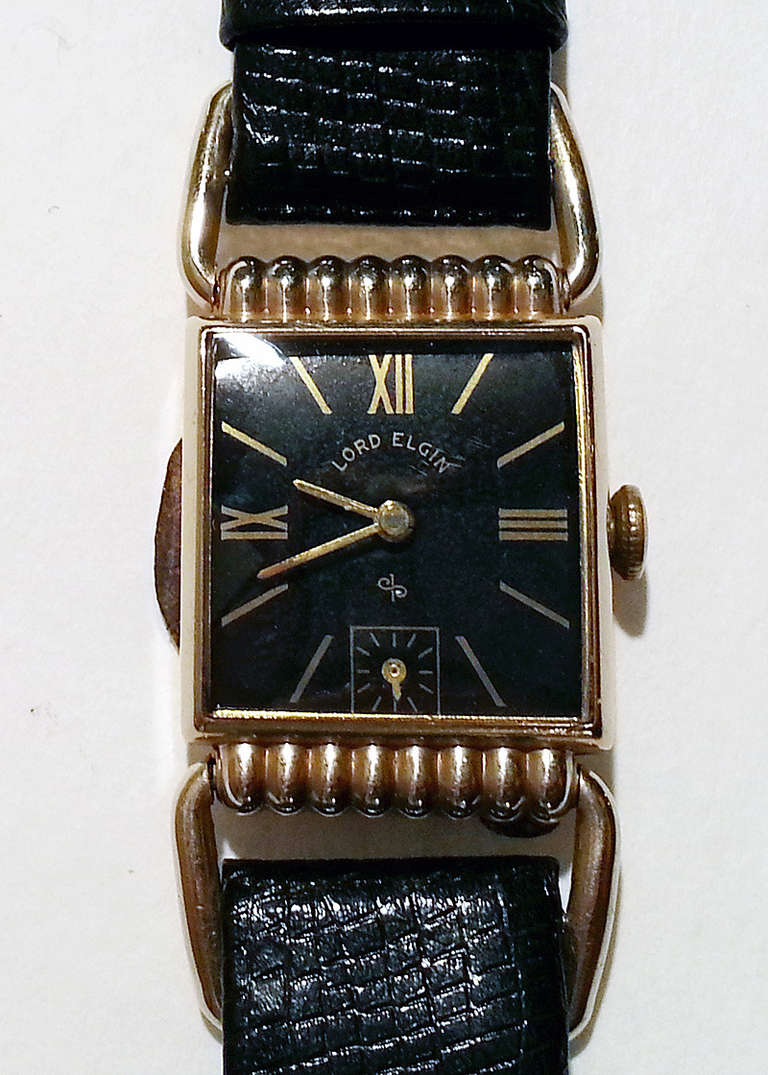 Lord Elgin 14-Karat Gold Drivers Swing Lug Wristwatch For Sale at 1stdibs