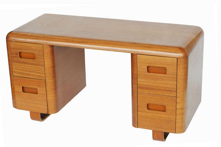 Streamline modern style birchwood desk by Paul Goldman for Plymodern. An interesting use of material and technique, this design was cutting edge in 1946. Also a matching bed available.

Paul R. Goldman (1914-2003) Mr. Goldman is considered "the