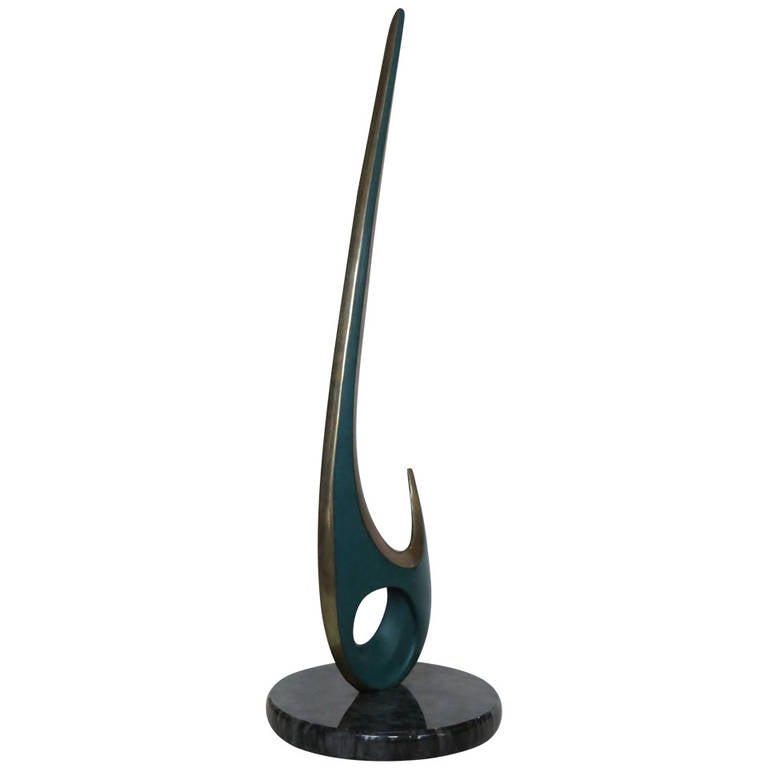 Biomorphic Bronze Abstract Sculpture with Enameled green accents fixed to a black marble base. Date and Signed 