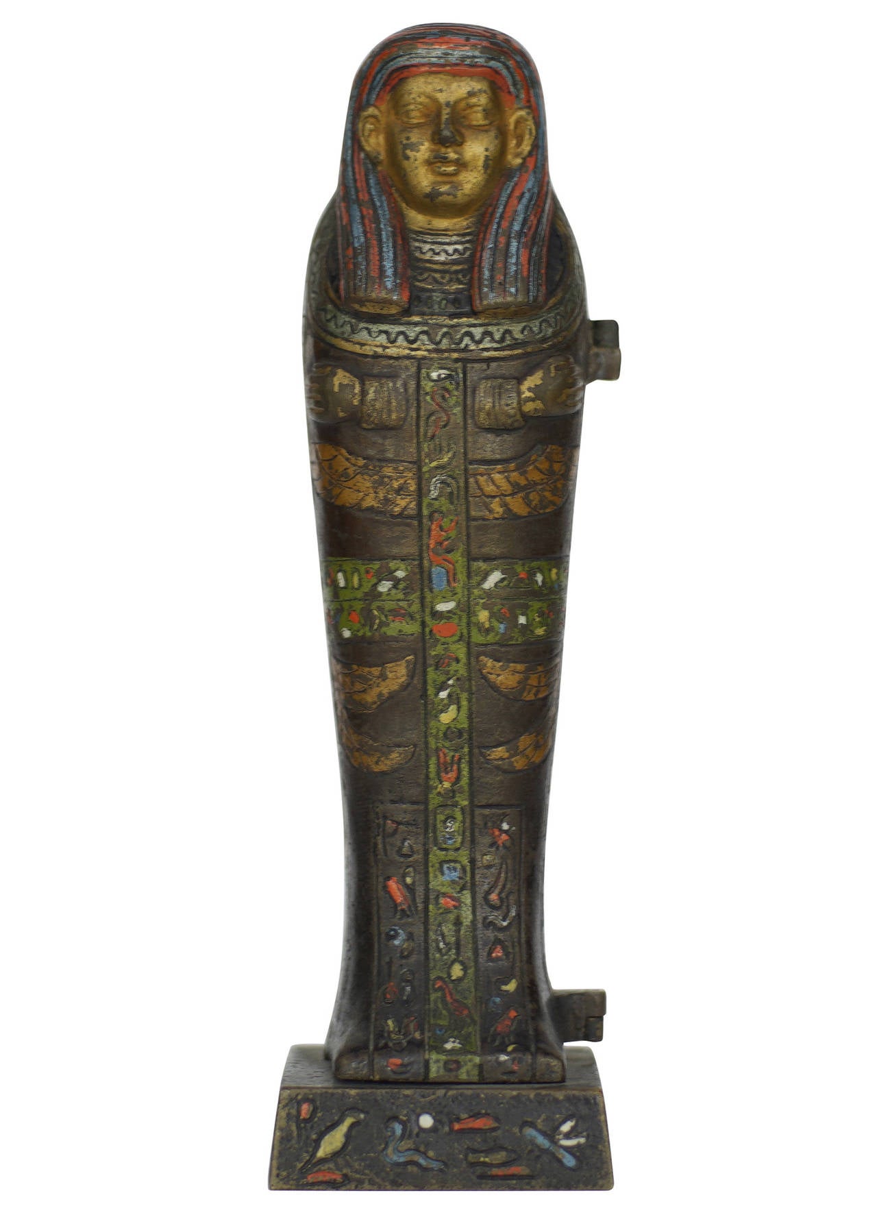 This piece is a Franz Xaver Bergmann cold painted Vienna bronze of an Egyptian sarcophagus decorated with small details and hieroglyphics. The sarcophagus opens on hinge to reveal a young nude nymph inside. 

This rare edition features a bronze