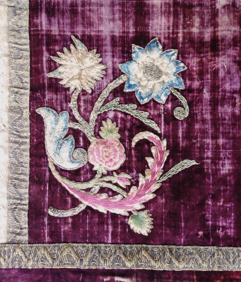 The larger-than-life, fantastic flowers and curving leaves and stems of this brocade banner, as well as the painterly use of polychrome silk embroidery and metal thread ornamentation, point to Italian and Sicilian vestments dating from the second
