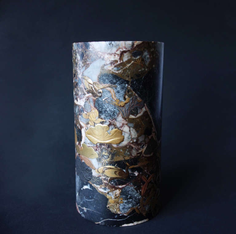 This is an unusual cylindrical marble vase and we haven't been able to find it’s parallel. A handsome example of maki-e lacquer-work, an ancient art of applying lacquer decoration mixed with the dust of precious and semi-precious metals. The