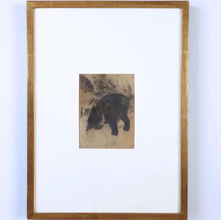 A charming album leaf of a bear in a landscape--a rare subject in Japanese art.

Dimensions of the gilt frame are 15 3/8