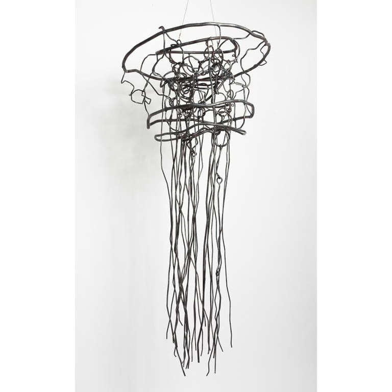 This hanging sculpture is one of a pair: King and Queen, two steel jellyfish. They are grave and weightless at once. 

Welz is a New York City-based artist whose interests range widely through the fields of sculpture and design. She has studied