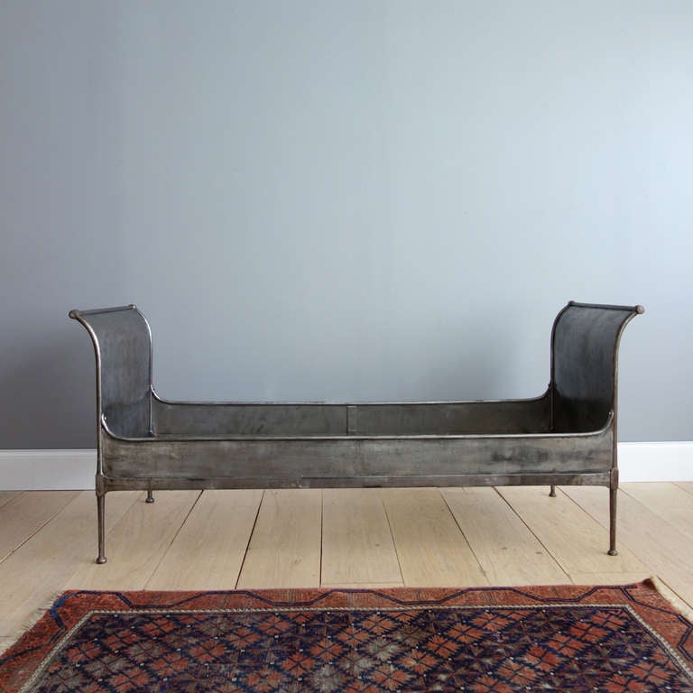 Campaign furniture was designed to be disassembled, packed up and carried on the march. It was perfected by the English and the French, colonists who didn't travel light. We pity the poor horse who had to haul this handsome hand-forged steel bed. It