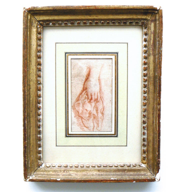 This beautiful and delicate rendering of a lady's hand was drawn by a late-Renaissance artist to be used as a working model when painting the portrait of a noblewoman.

Most likely Flemish in origin.

In an antique gilt-wood frame.