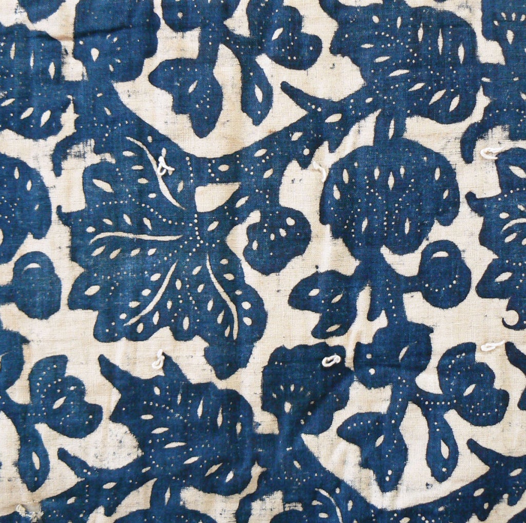 An uncommon and beautifully-preserved survivor of early American textile art. The boldly-printed indigo design with its picotage detail seems to vibrate on the white cotton ground. We find the colonial-era pattern, which shows the influence of trade