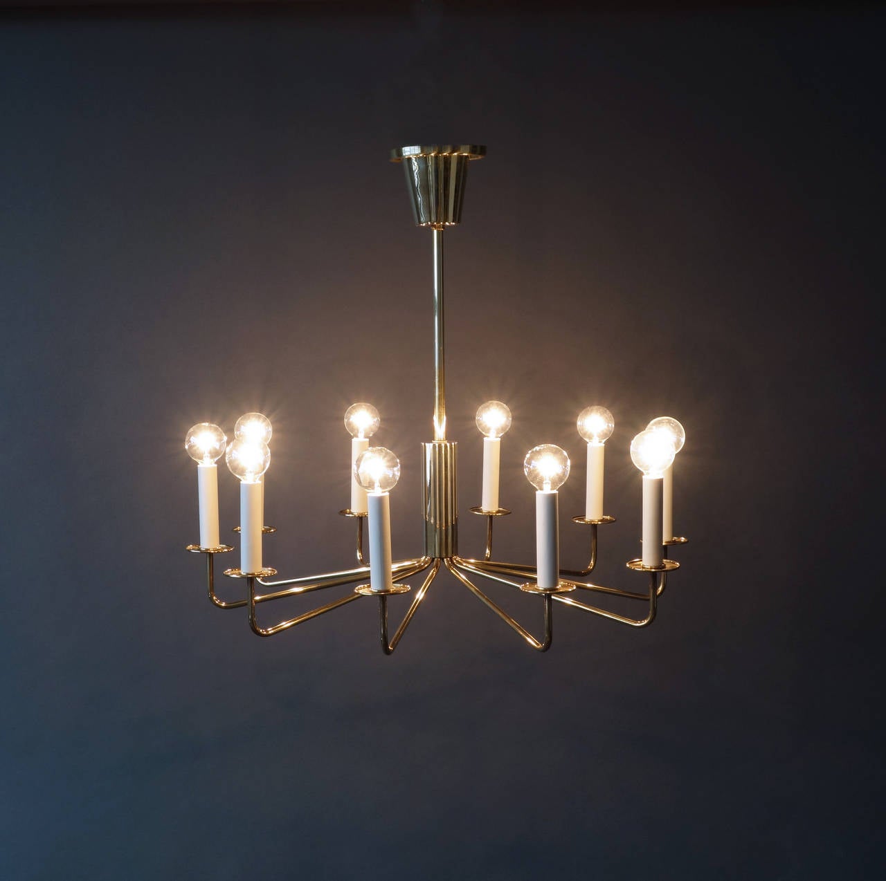 An elegant ten-light chandelier. Modern, yet at home with any era.