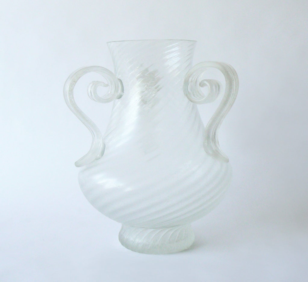 An impressive hand blown Murano glass vase with fluted body and three applied handles in the manner of Cenedese.