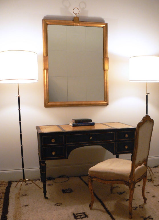 A Monumental Gilt Wood Mirror by Tommi Parzinger