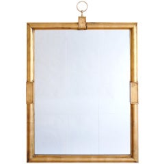 A Monumental Gilt Wood Mirror by Tommi Parzinger