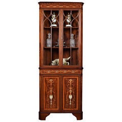 Mahogany and marquetry inlaid corner cabinet