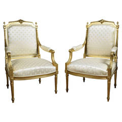 Pair of French Louis XVI Style Giltwood Armchairs