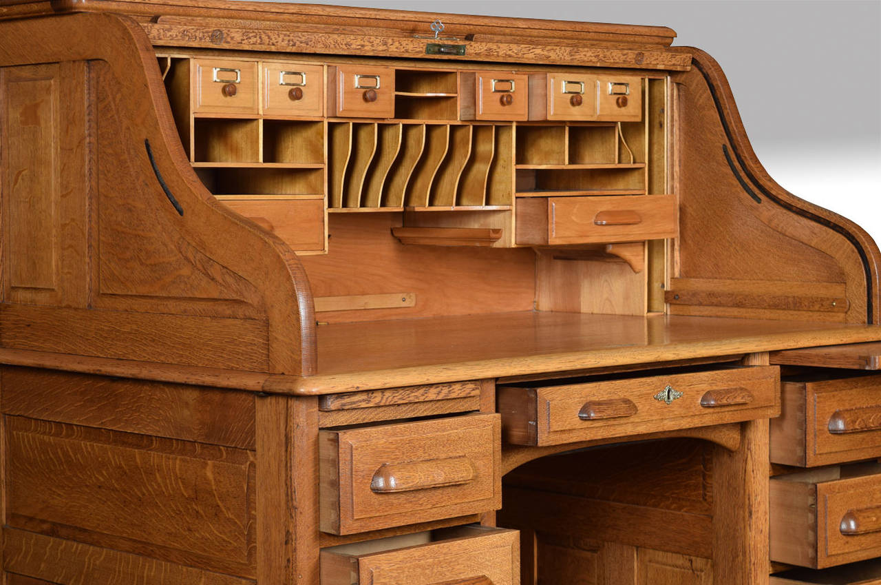 Late Victorian Oak pedestal roll top desk