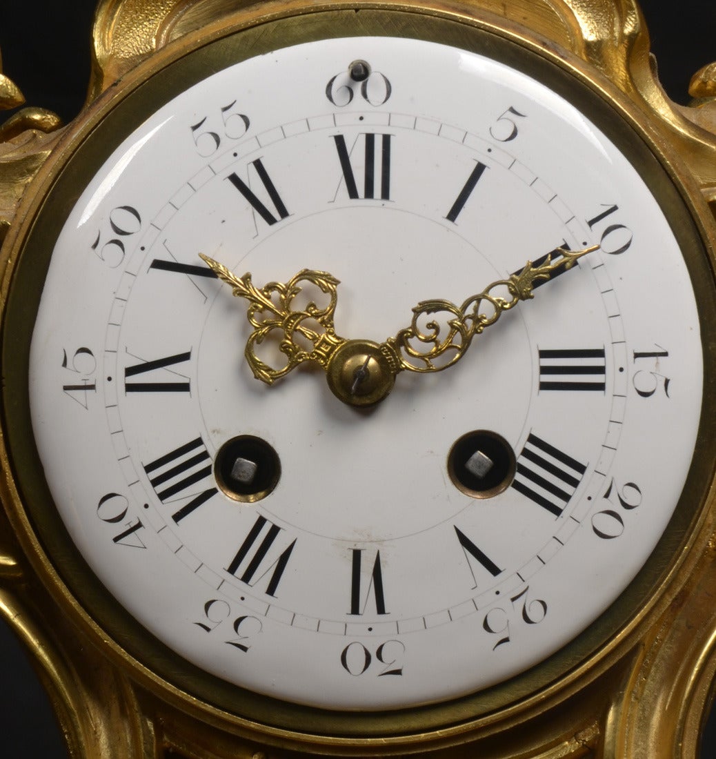 French three piece gilt metal mantle clock set 1