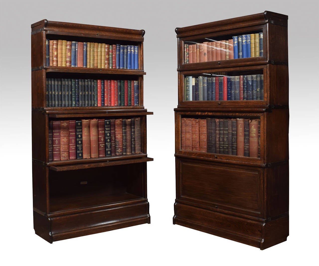 Pair Oak globe Wernicke four section bookcases