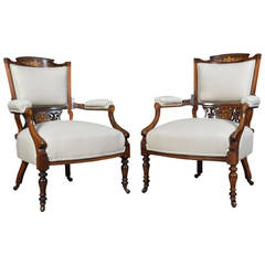 Pair of Edwardian inlaid rosewood armchairs