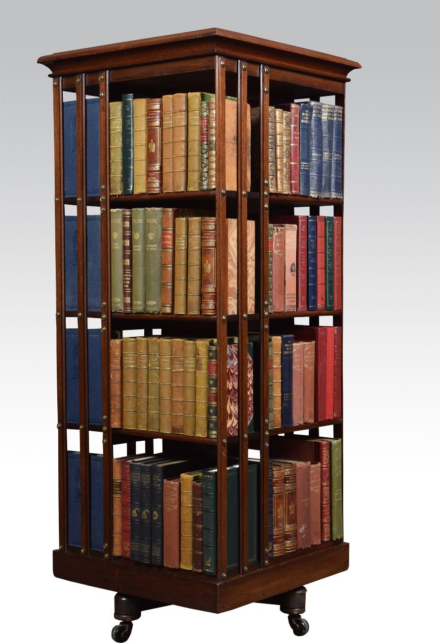 Mahogany revolving bookcase having four tiers with a arrangement off shelves raised up on unusual removable cruciform base with castors

Dimensions

Height 50.5 Inches

Width 20 Inches