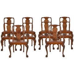 Set of ten walnut George II style dining chairs