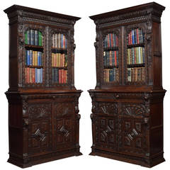 Pair of Renaissance Revival Carved Oak Bookcase Cabinets