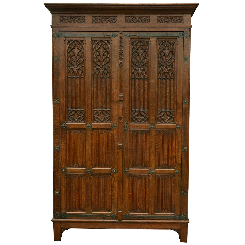 Large Gothic revival oak wardrobe