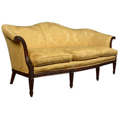 19th century mahogany framed 'camel back' settee in the George III manner