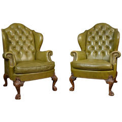 Antique Pair of leather wing armchairs in the George II style