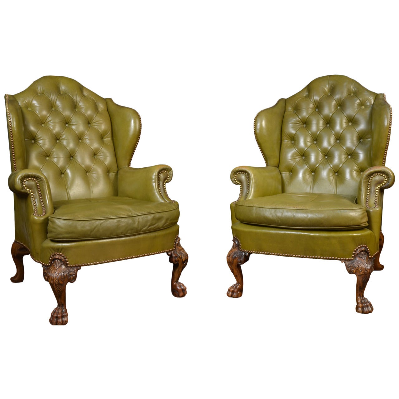 Pair of leather wing armchairs in the George II style