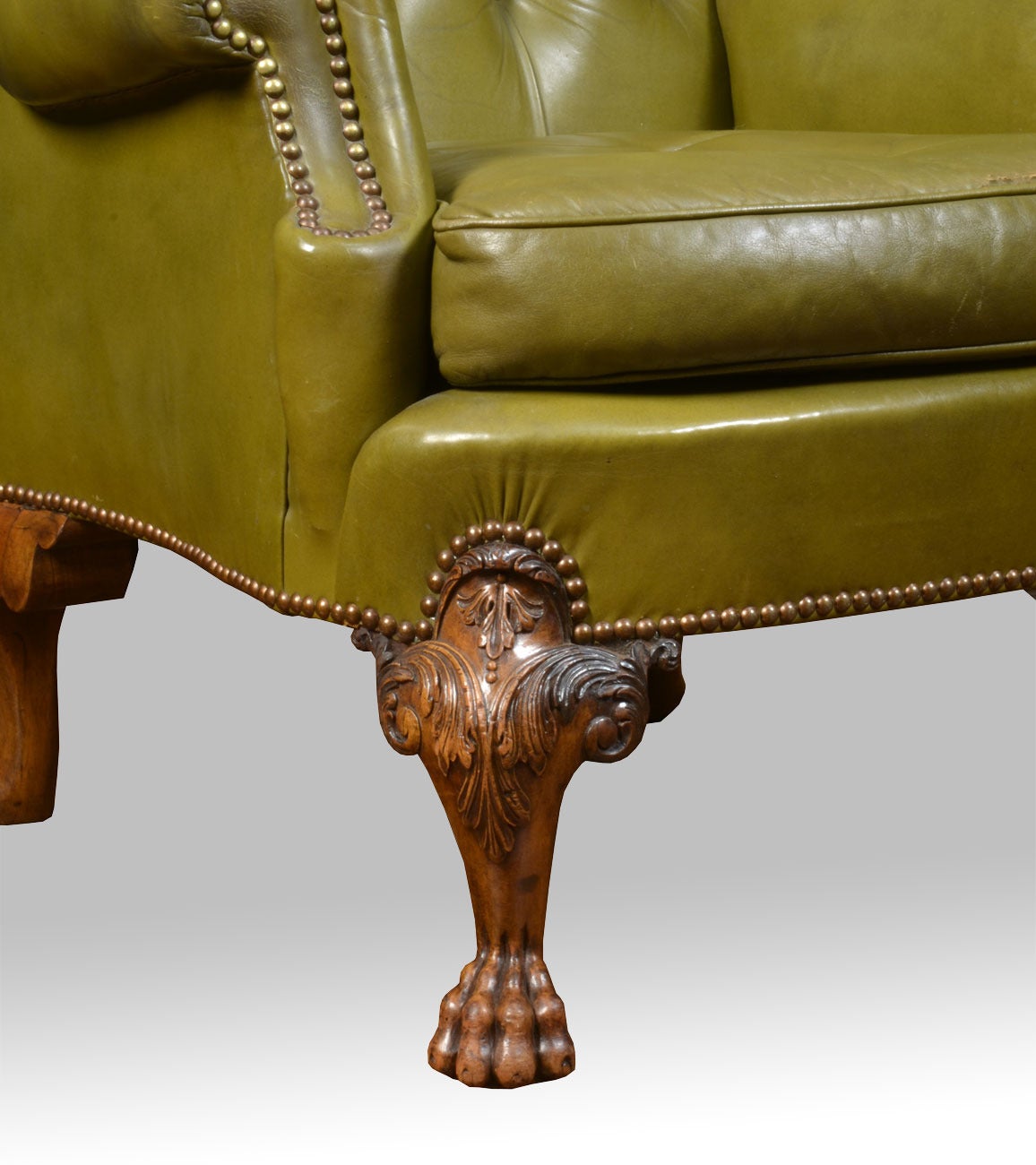 19th Century Pair of leather wing armchairs in the George II style
