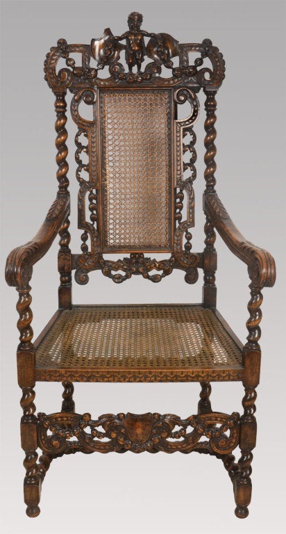 Pair of carved oak arm chairs