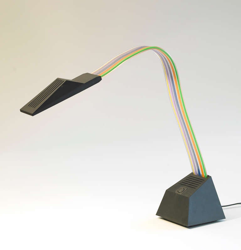Producer : Stilnovo
Sold out edtion
This halogen lamp is made up of a flexible stem in multicoloured plastic which can be adjusted in all directions, a reflector and a transformer in Makrolon and a switch with 2 positions

Bibliography