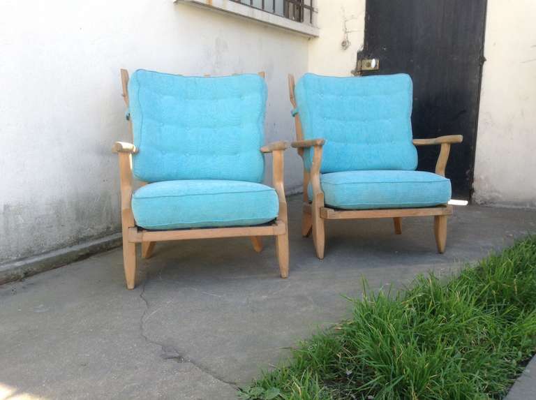 1960's pair of oak armchairs by Guillerme et Chambron. 'Confort' model reference. New fabric.