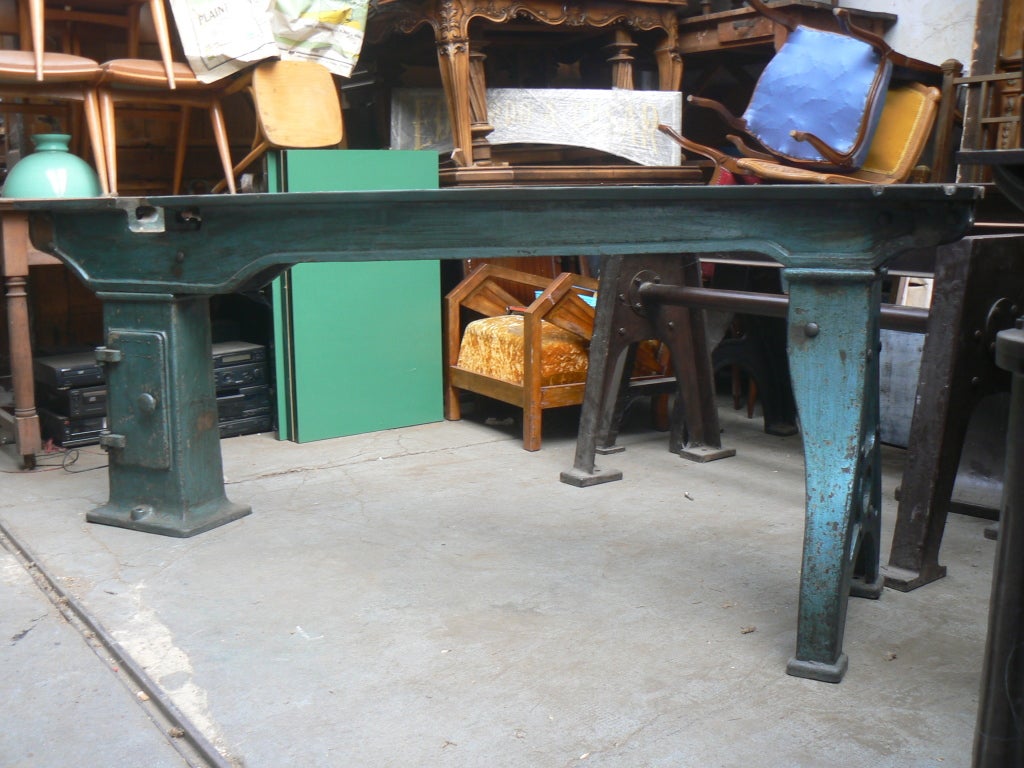 1930's long blue iron industrial table mahogany top rivets