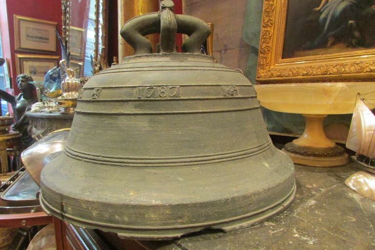 rare 18th century 
dated 1787 
chapel or church bronze bell 
it's rare because during the french revolution most of the bells have been molten to make cannons