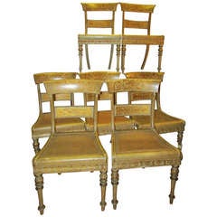 XIXth century serie of seven gilt wood lacquered italian cane chairs