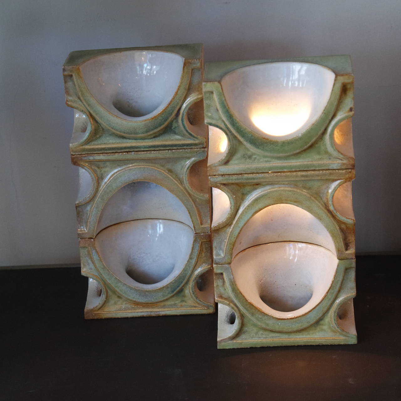 Pair of enameled sconces by Jean Derval made as his claustras